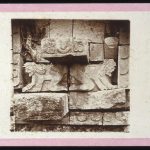 Uxmal- Pyramid of the Magician, Temple IV; 2 kneeling figures above center of doorway. ca.1876