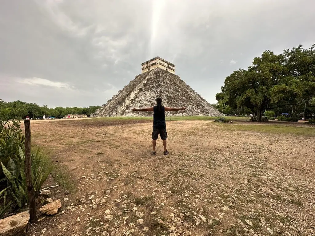 Anyextee facing Kukulkan pyramid at Chichen Itza