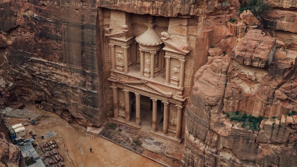 Stunning aerial view of Al-Khazneh, Petra in Jordan, showcasing ancient architecture.